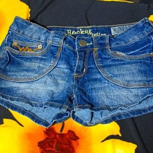 Rocks and indigo shorts